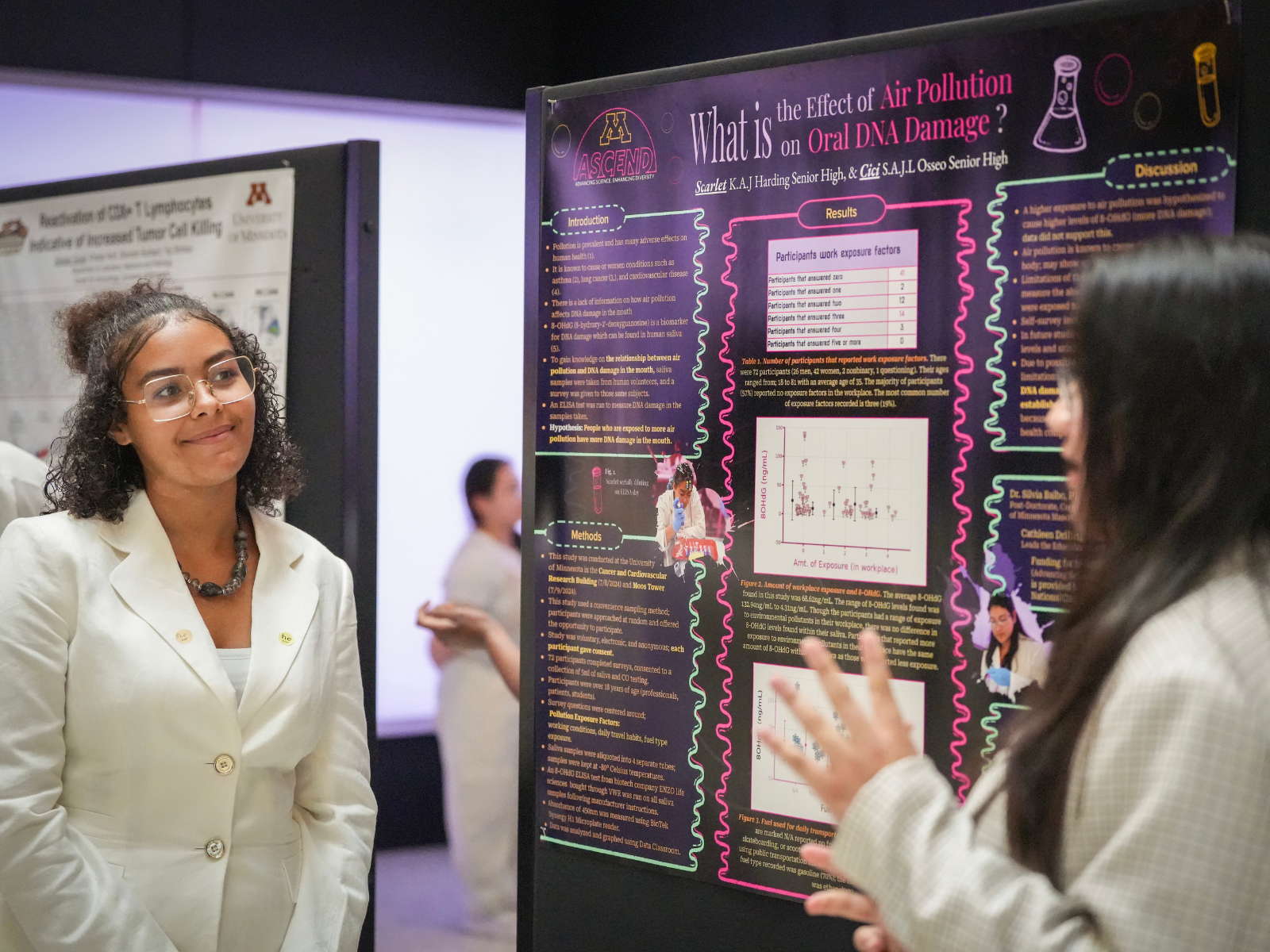 Two students talking about research project